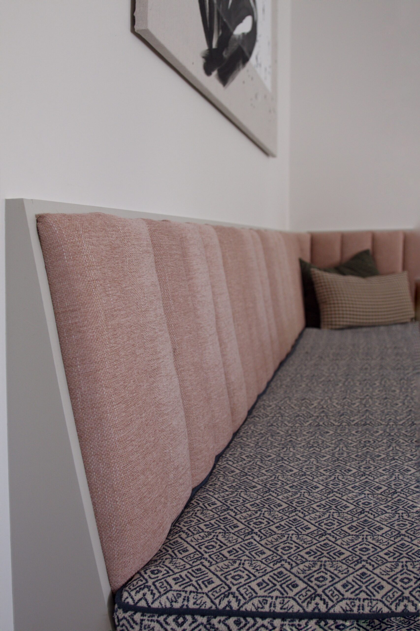 Custom Banquette with Upholstered Channels in Pink Fabric